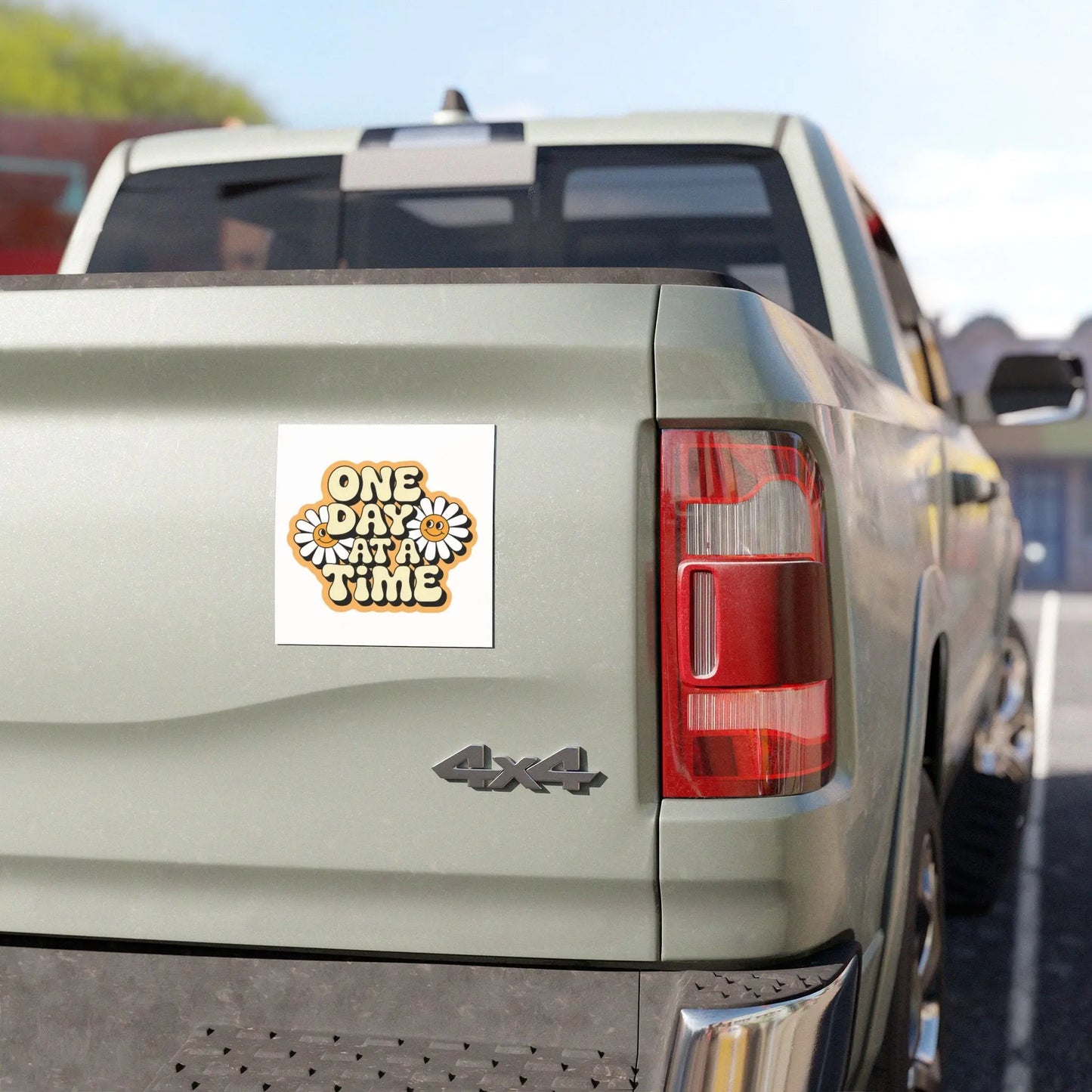 One Day At A Time retro car magnet on a silver truck tailgate by SoberSips Recovery.